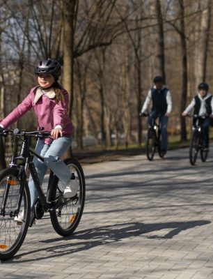 full-shot-family-cycling-together